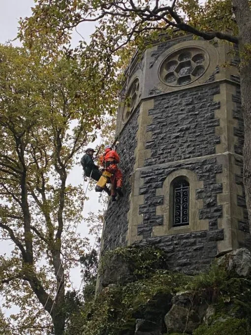 People Inspecting the Tower