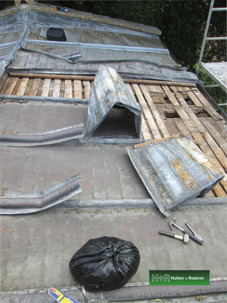 Broken metal roof panels